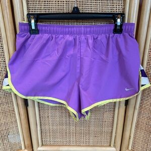Nike ladies dry fit, running shorts, built-in underwear, size medium purple